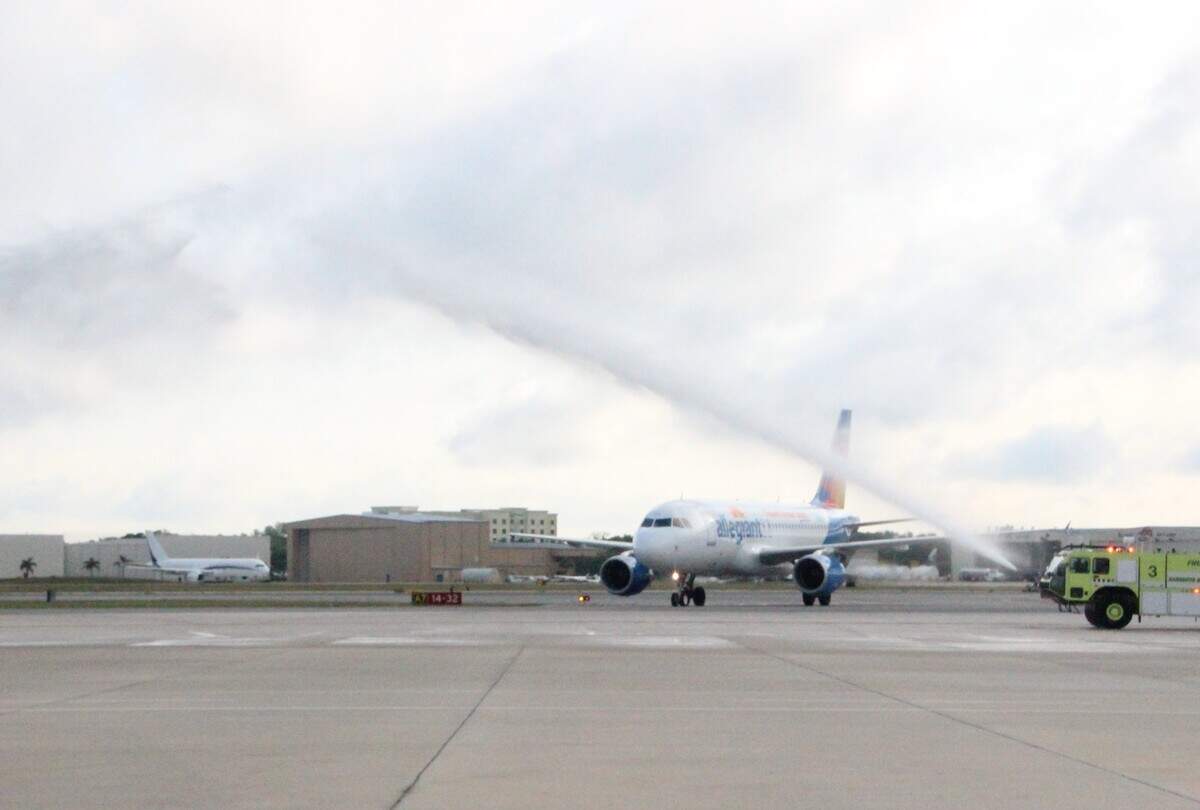 Low-cost carrier Allegiant's first arriving flight at Sarasota Bradenton International from Indianapolis was greeted by water cannons on Wednesday,