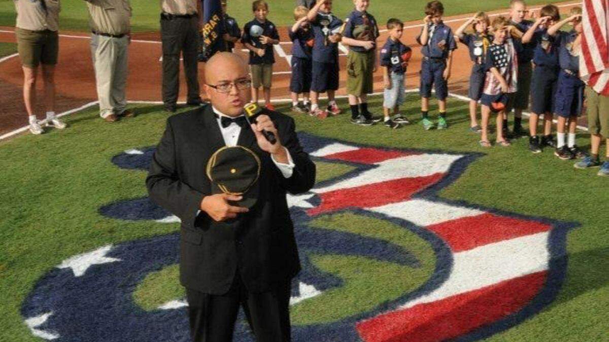 Paul Villaluz, performing above, was one of about 16 amateur singers who were picked last year to sing the National Anthem before Pittsburgh Pirates' Spring Training games at McKechnie Field. The Pirates expect 40 to 60 will show up at auditions on Jan. 30 for another 16 spots for this coming Spring's games. Villaluz will audition again as past winners are not automatically granted a spot on the 2016 Anthem roster. 
 PROVIDED PHOTO