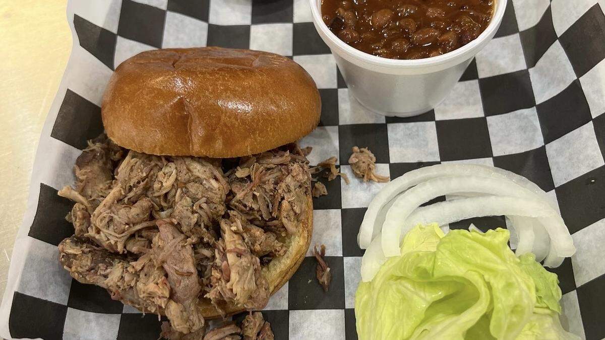 A smokes pulled pork sandwich is one of the menu offerings at BeerSauce Shop, 419 Cortez Road W., Bradenton. The business opened on Thanksgiving and will host a grand opening celebration noon- 7 p.m. Dec. 30.