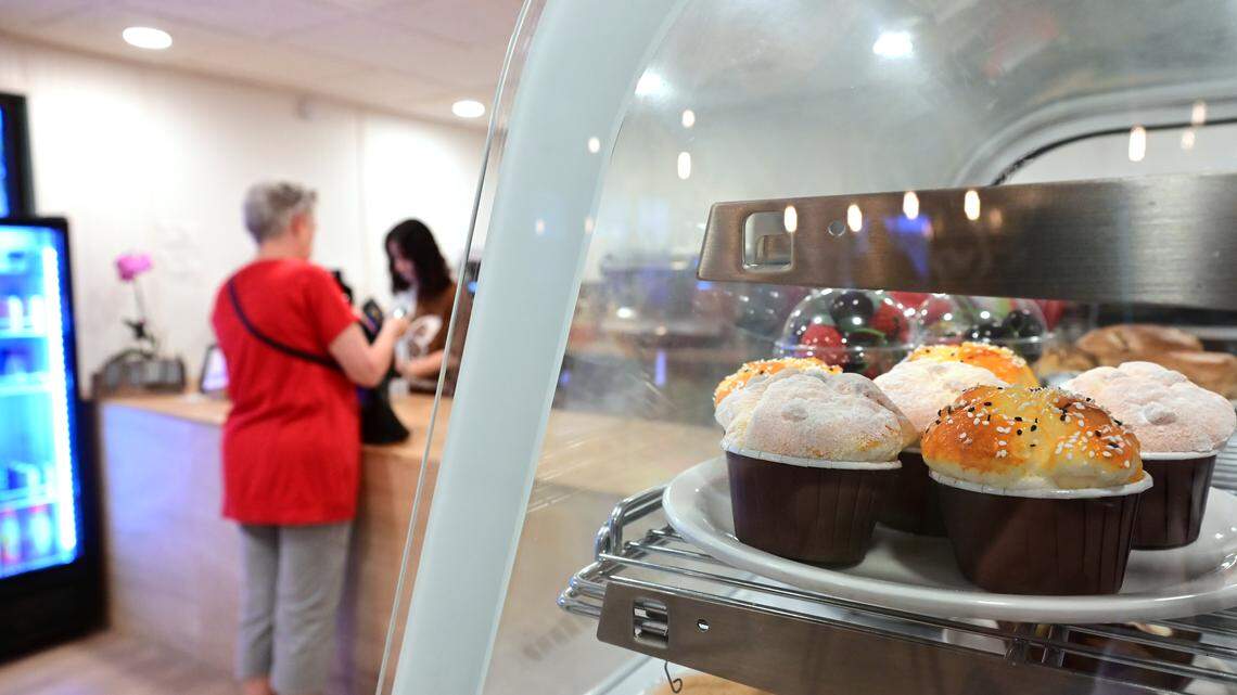 Customers pick up coffees at Spinning Coffee at 515 36th Street West, Suite E, Bradenton, on April 21, 2026. 