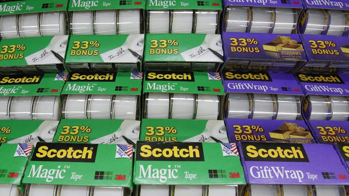 FILE - In a Jan. 28, 2014, photo, rolls of Scotch tape, a 3M brand, are displayed in a Walmart store in Robinson Township near Pittsburgh. 3M reports quarterly financial results Thursday, Oct. 22, 2015. (AP Photo/Gene J. Puskar)