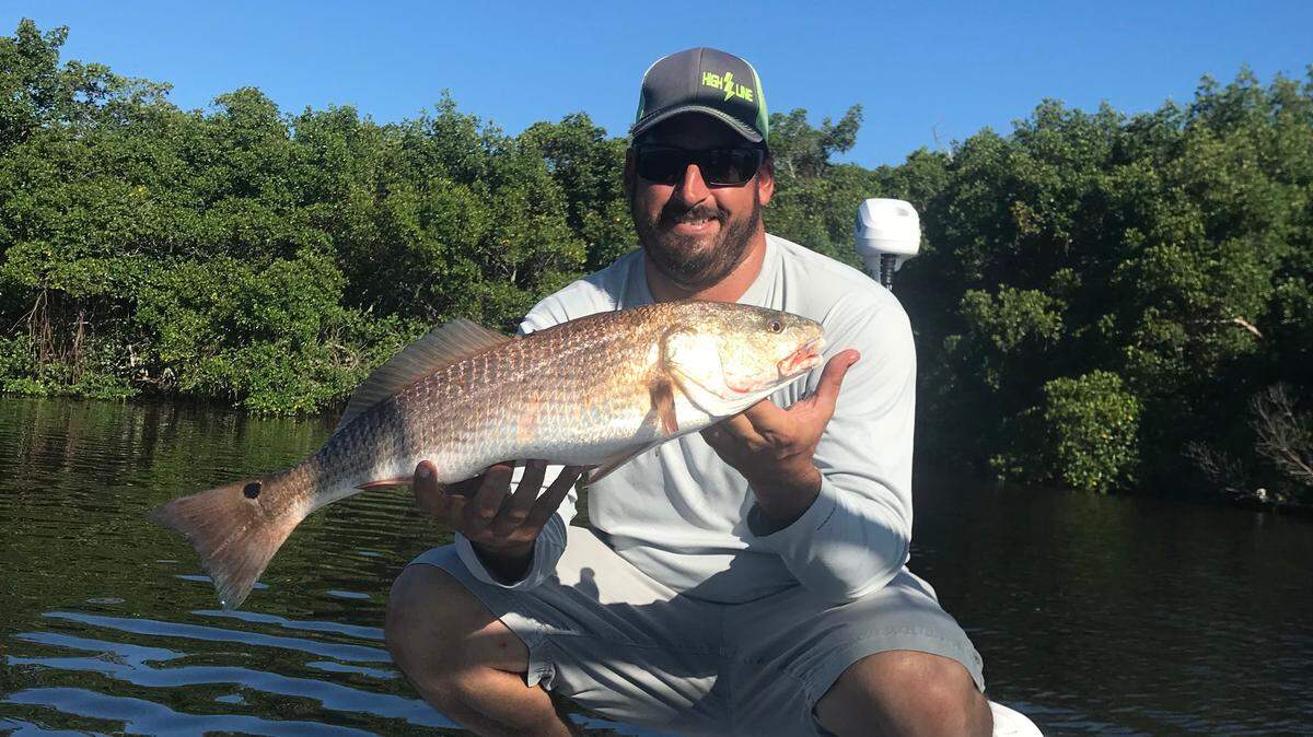 Nathan Hardbord with a redfish caught fishing for the IFA Redfish Tournament.