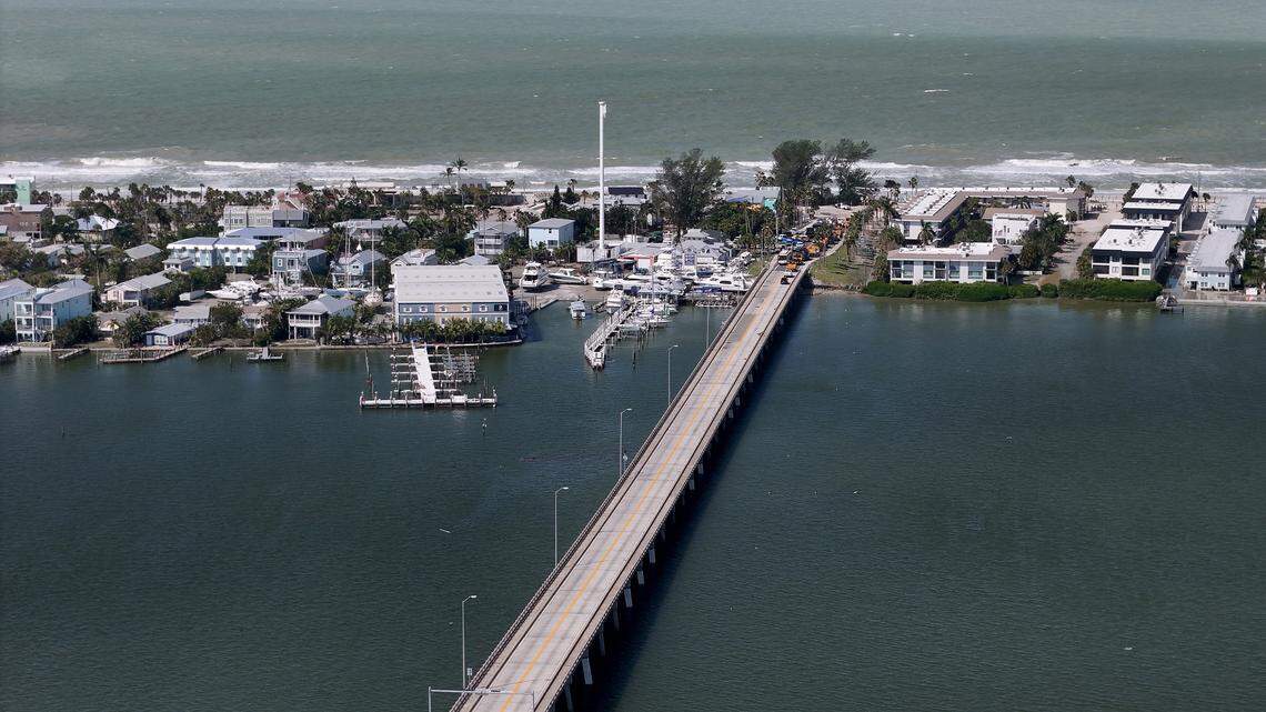 Heavy equipment trucks crossed the Cortez Bridge to Anna Maria Island in the aftermath of Hurricane Helene in Manatee County on Friday, Sept. 27, 2024.