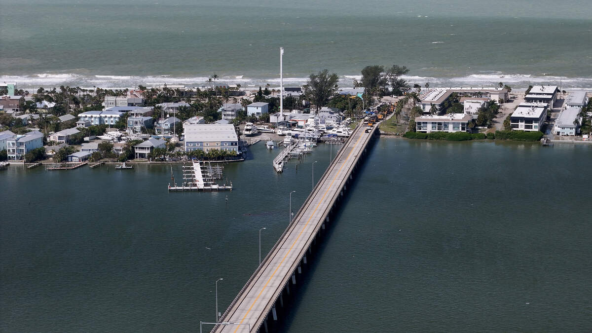 Heavy equipment trucks crossed the Cortez Bridge to Anna Maria Island in the aftermath of Hurricane Helene in Manatee County on Friday, Sept. 27, 2024.