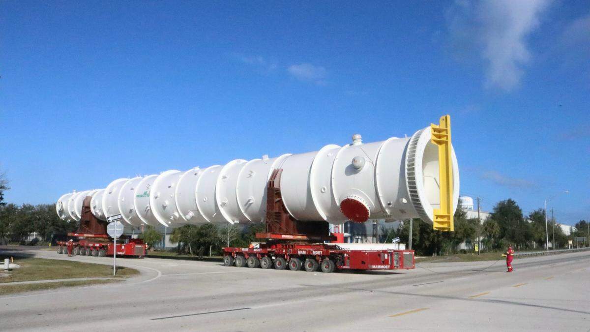 For a few minutes 2/4/2022, the Florida Highway Patrol blocked traffic in both directions on the four-lane U.S. 41 north of Palmetto as a 173-foot exchanger moved at walking speed toward the waiting barge at Port Manatee.&nbsp;