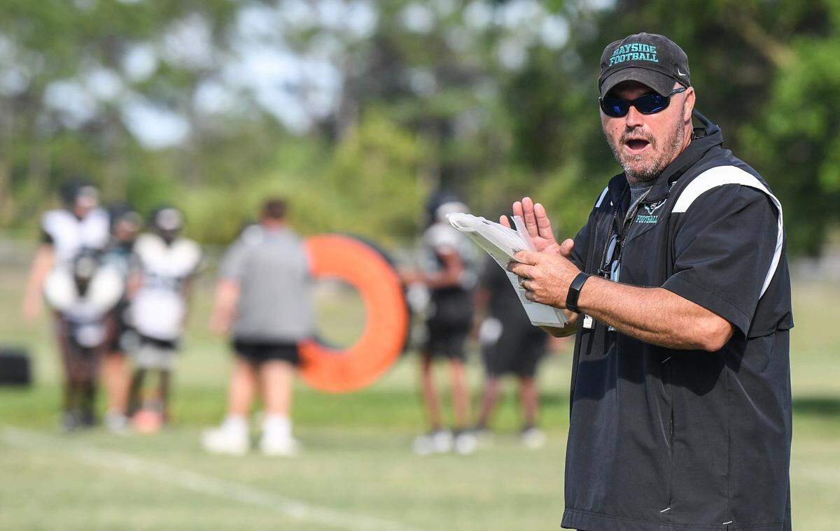 Bayside football head coach Billy Miller watches his players during practice Thursday, May 11, 2023. Craig Bailey/FLORIDA TODAY via USA TODAY NETWORK