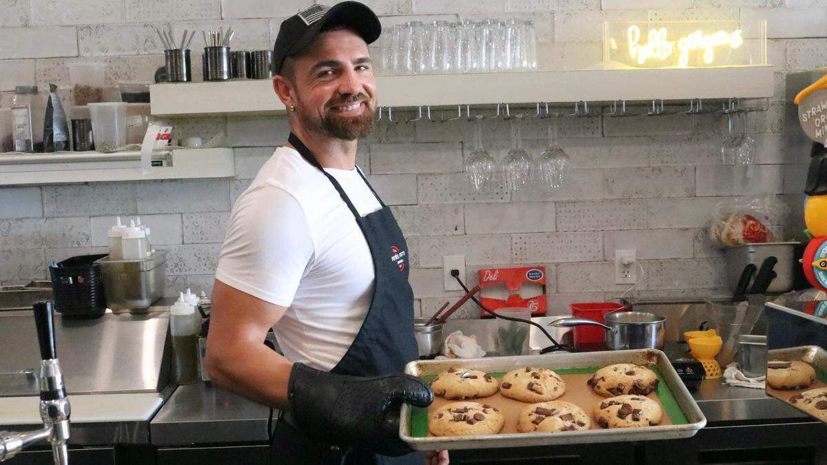 Andrew Grossman removes chocolate chip cookies from the oven at Fifty Three Fifty The Pourhouse, 5350 Gulf Drive, Holmes Beach.