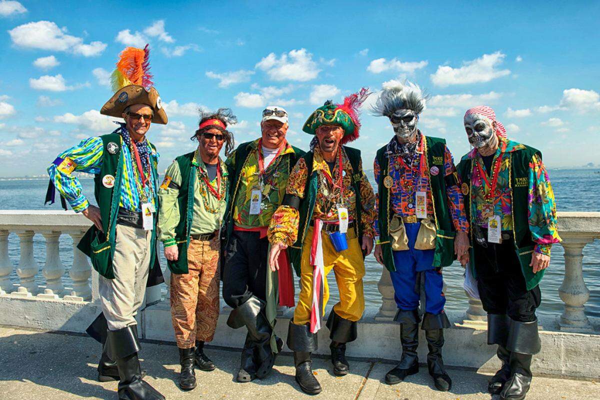 Members of ye Mystic Krewe of Gasparilla march through the streets of Tampa during the annual Gasparilla Pirate Festival.