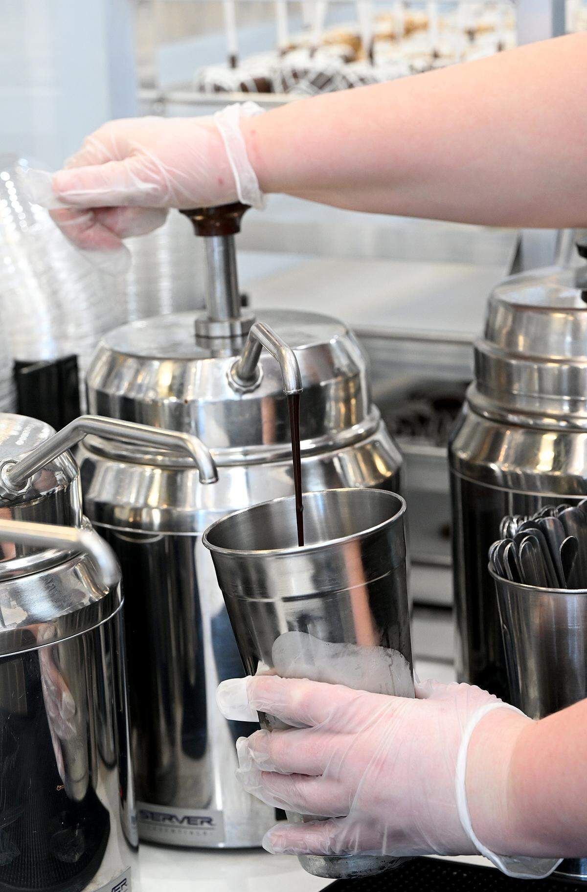 Manager Bailey Barry works on a sweet treat of milkshakes for a family at The Milkshake Factory at 7230 Manatee Ave. W. on Jan. 21, 2026.