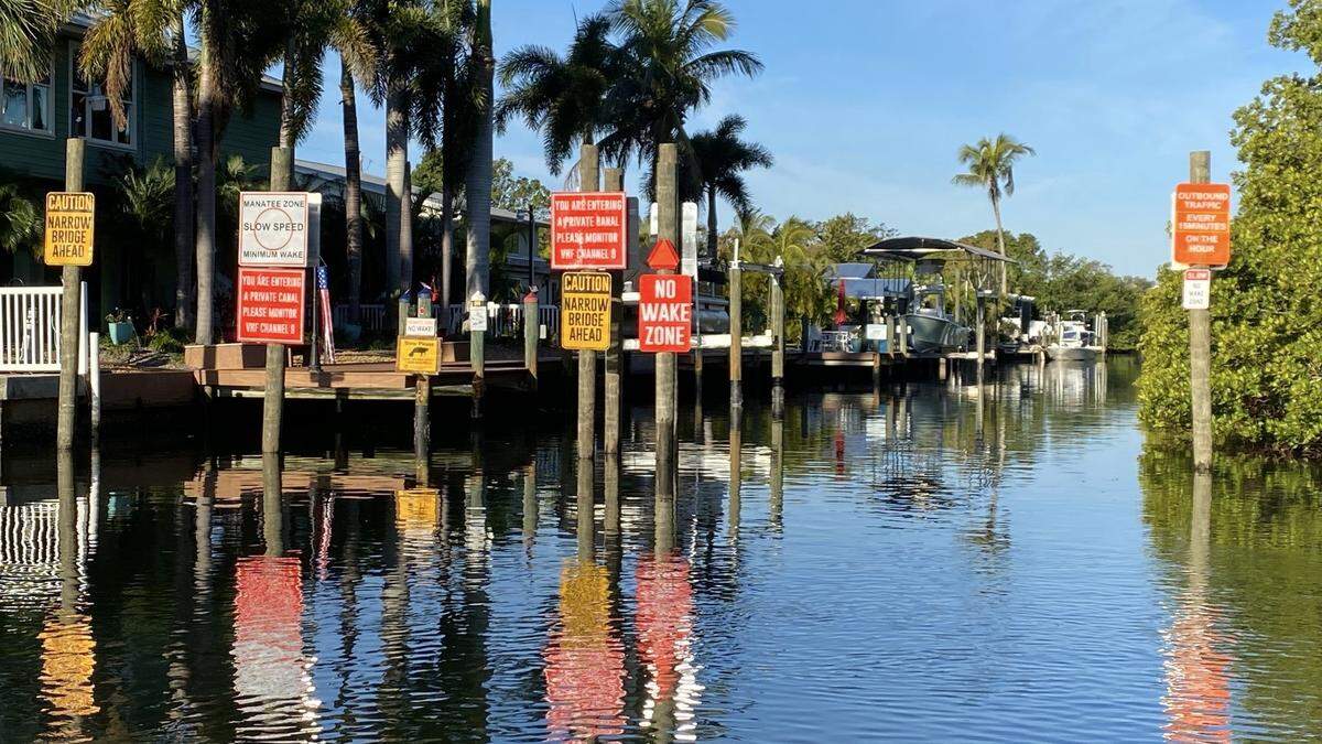 The developer of Hunters Point recently placed pilings displaying navigational aids in a Cortez canal. The Southwest Florida Water Management District is investigating whether this was legal and if the developer should face penalties. The canal feeds into Sarasota Bay.
