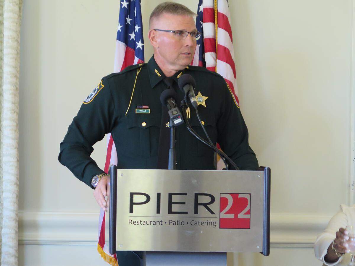 Manatee County Sheriff Rick Wells addresses the crowd at the Manatee Tiger Bay Club meeting Thursday at Pier 22 in Bradenton. Several law enforcement officials were panelists at the meeting which addressed crime rates in the county.