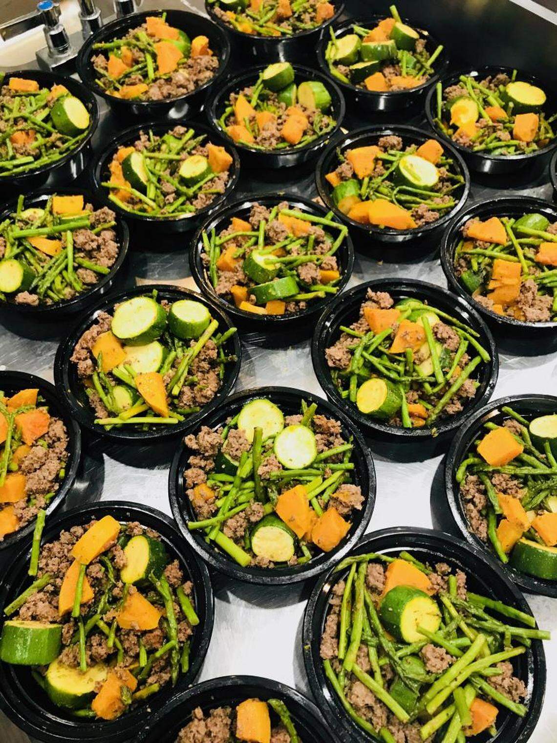Morrison switches up the menu at Power Meals a few times a week. Pictured here are bowls of grass-fed ground beef bowls with herb roasted vegetables.