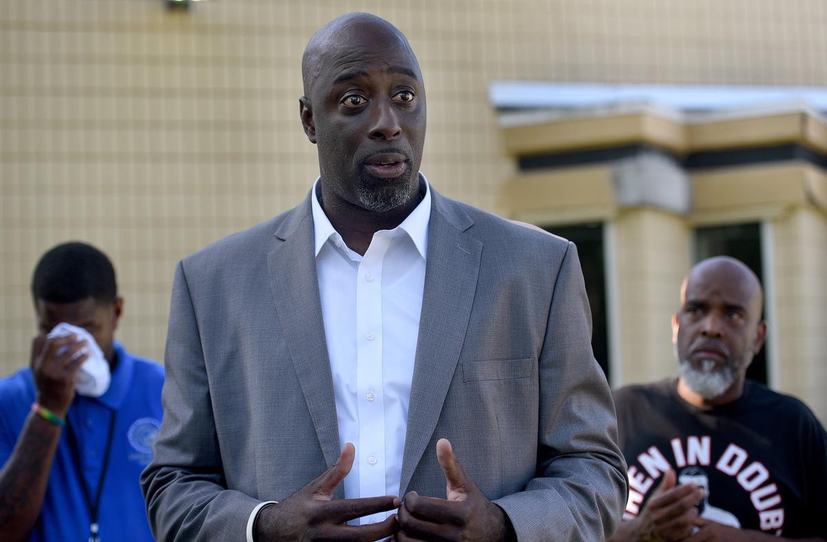 In this file photo from Sept. 18, 2018, Eddie Hundley, principal of Lincoln Memorial Academy, holds a press conference outside the Palmetto Police Department.