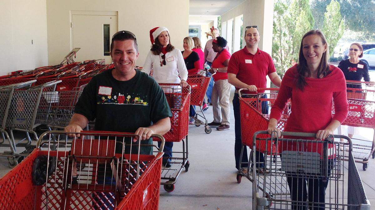 Salvation Army "elves" get ready to help families by gathering Christmas gifts. Being a volunteer elf is a good way to feel good throughout the stressful holiday season, Salvation Army officials said. PROVIDED PHOTOS