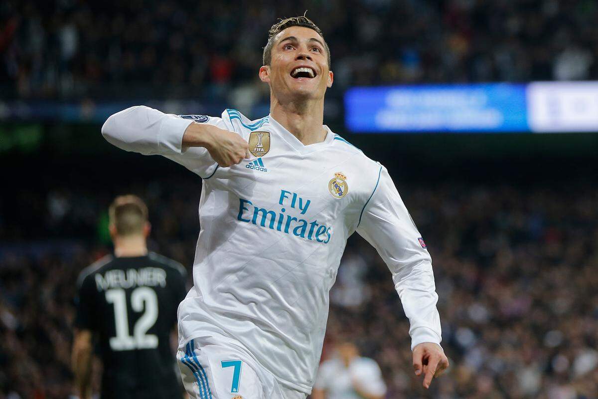 In this Wednesday, Feb. 14, 2018 file photo Real Madrid's Cristiano Ronaldo celebrates his side's 2nd goal during the Champions League soccer match, round of 16, 1st leg between Real Madrid and Paris Saint Germain at the Santiago Bernabeu stadium in Madrid, Spain.