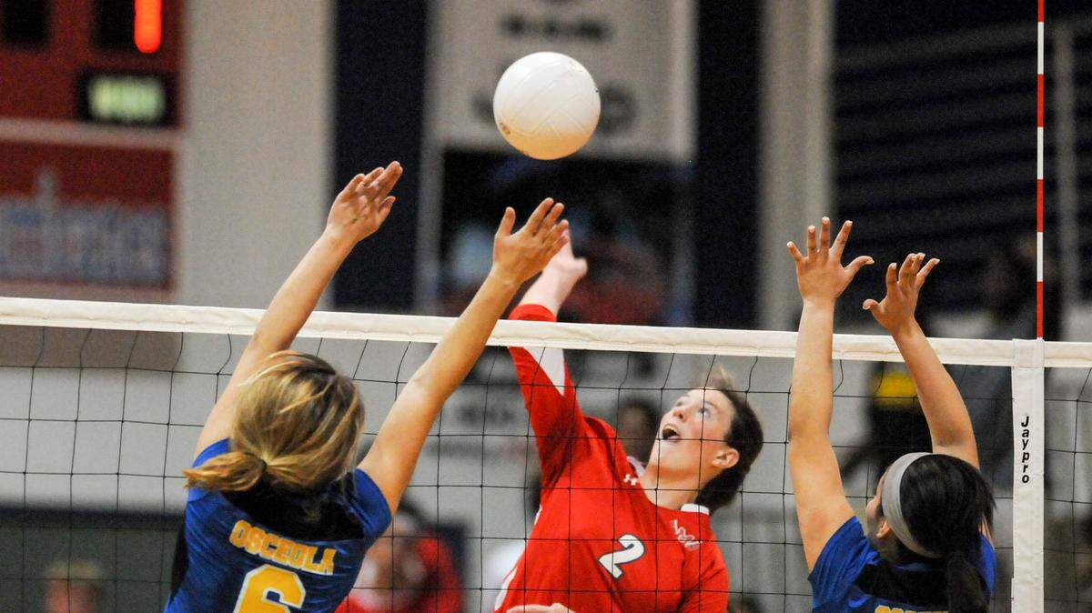 Haley Coulter slams a kill during Manatee's four-set win over Kissimmee Osceola on Tuesday.