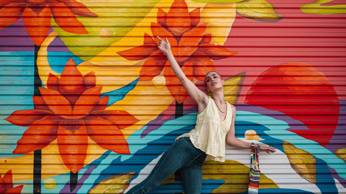 Organizer Nadria Senoussi, a freelance model, fluid artist and stylist, shown above, hopes to make Shop, Swap, and Shoot a regular event in the Village of the Arts on the third Saturday of each month.
