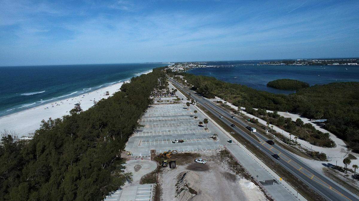 The parking lots at Coquina Beach on Anna Maria Island are undergoing construction to improve drainage and problems with standing water. Some portions are completed and open, while others are still undergoing work.
