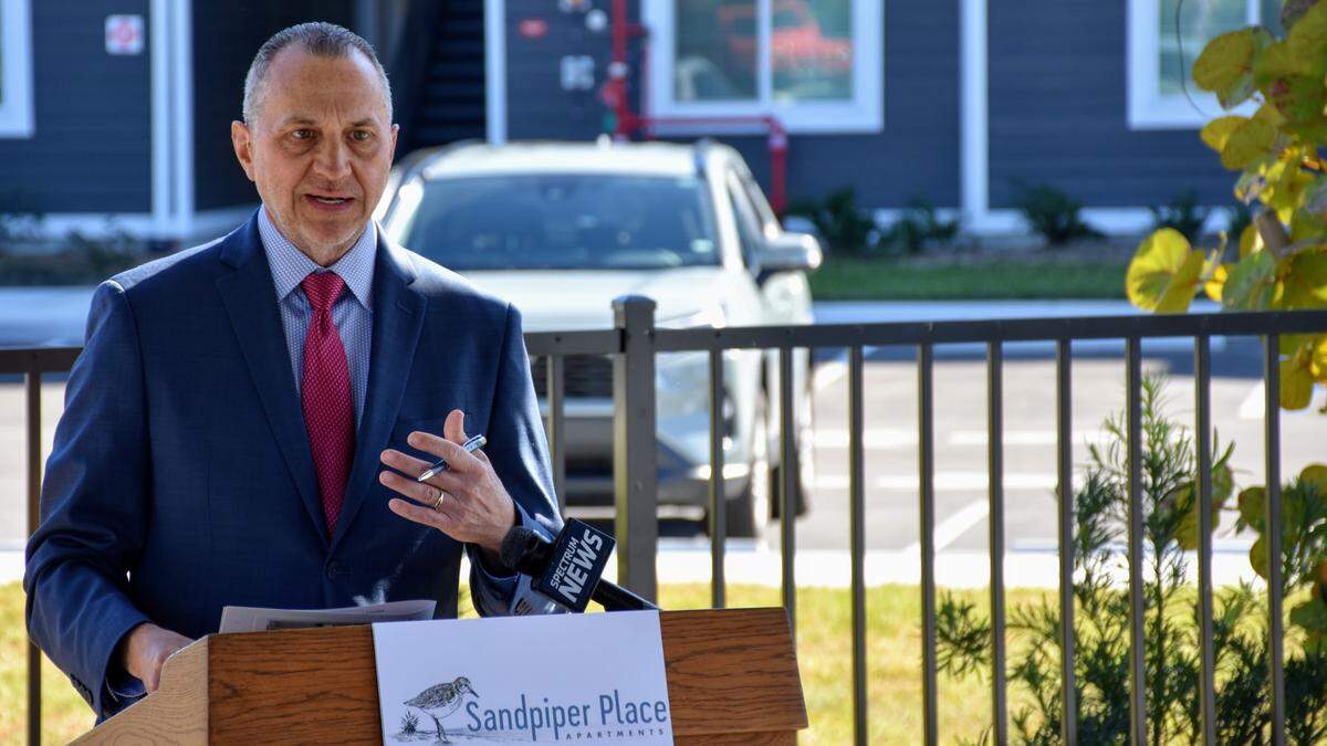 Blue Sky Communities President and CEO Shawn Wilson speaks during a ribbon-cutting ceremony for his company’s latest affordable housing project, the Sandpiper Place Apartments in Bradenton. The complex provides 92 units, but a waitlist has already attracted more than 800 people interested in living there.