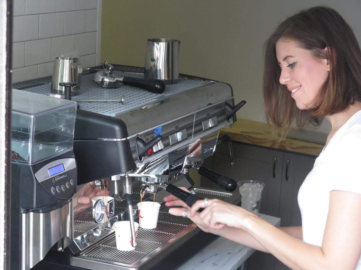Erica McCreadie prepares coffee for customers at the Tellers window. She has been a barista for the past 10 years and will co-own Bradenton's newest coffee shop along with Lauri Contarino.
