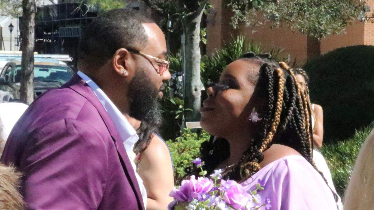 After five years together, Kory Tensley, left, and Jael Readus joined 10 other couples in a group wedding to exchange vows at the Historic Manatee County Courthouse on Valentine’s Day, Feb. 14.