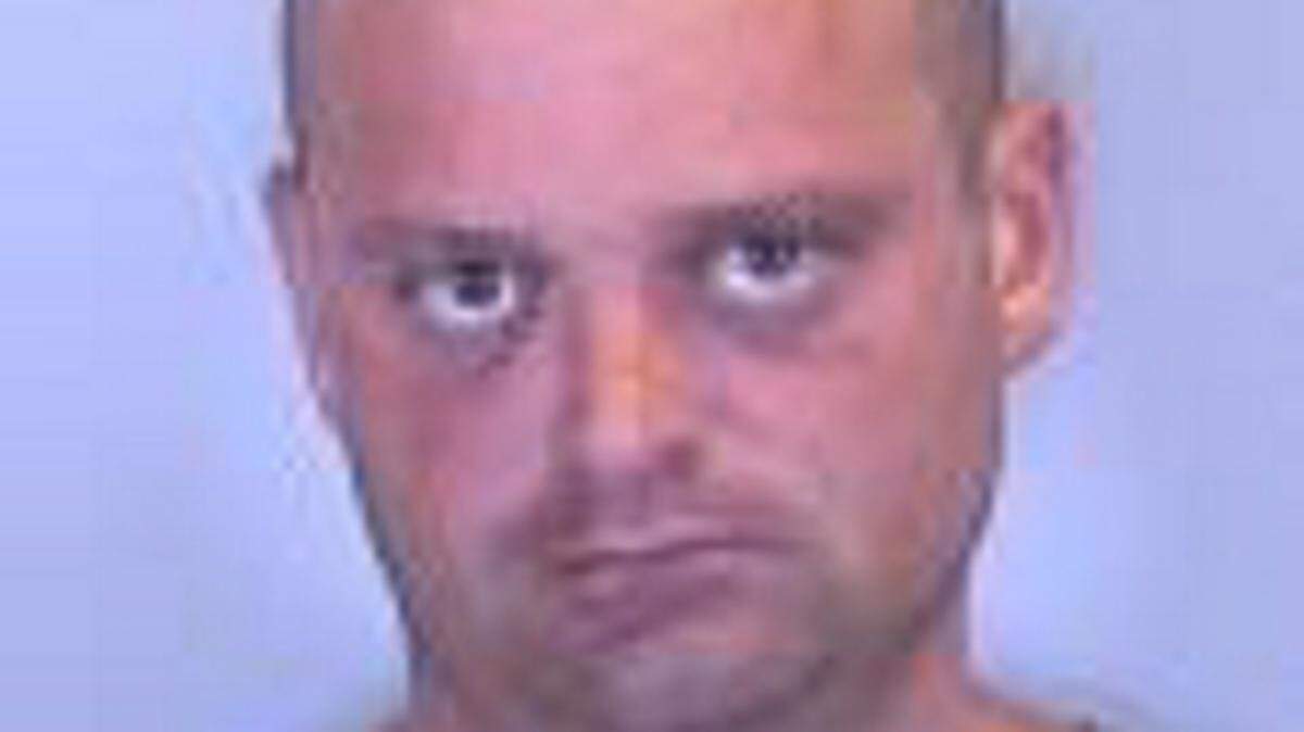 Timothy A. Vaughan's Kia Sportage collided with a motorcycle Friday night. A 20-year-old woman died.