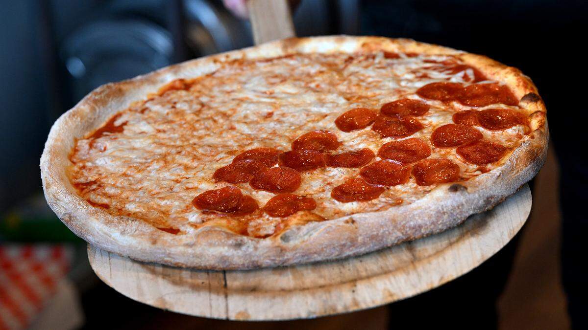 Fresh from the oven, a cheese and pepperoni pizza at Wolveshead, which recently opened at 5348 34th St. W., Bradenton, shown on Friday, Oct. 17, 2025.