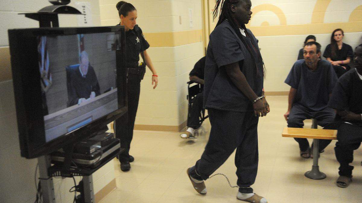 Keishanna Thomas is taken from an isolation area at the Manatee County jail to appear before a judge Wednesday afternoon to face murder charges in the death of her daughter, Janiya. 
 GRANT JEFFERIES/Bradenton Herald