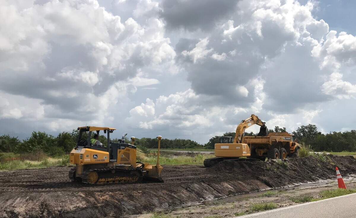 Development is rapidly changing the face of Moccasin Wallow Road. Work is underway, above, on new communities across the street from Neal Land’s proposed Morgan’s Glen mixed-use community.