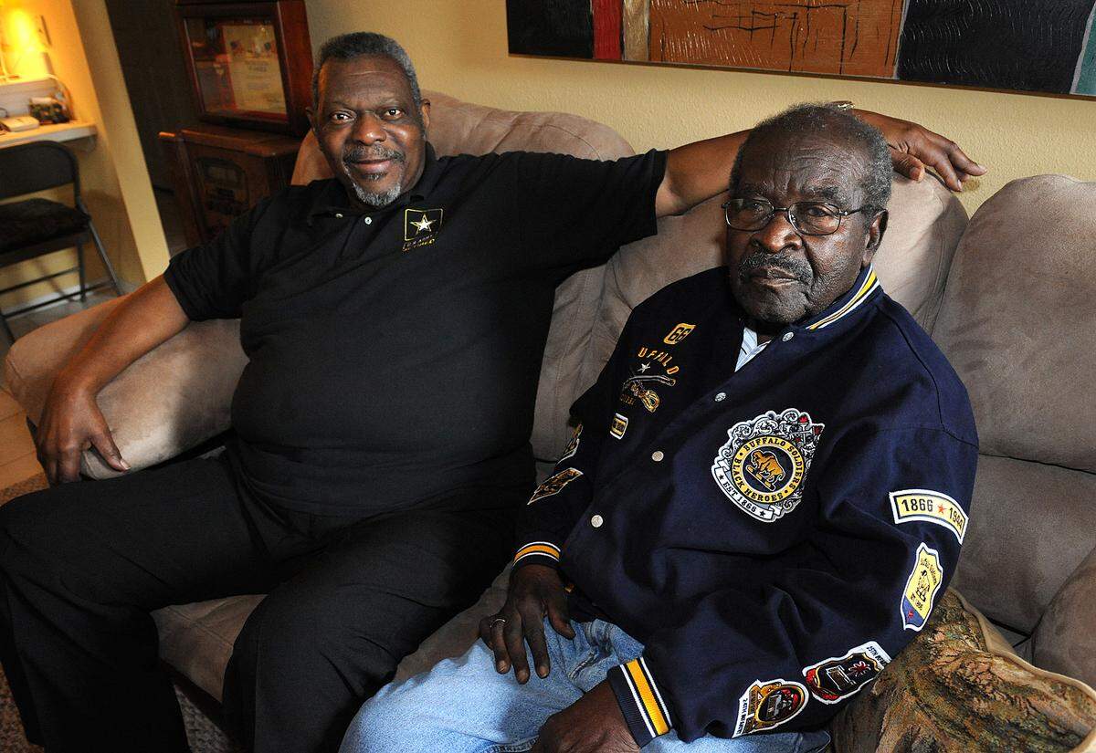 1/30-2014--Henry Blyden, Vietnam combat veteran and Steve Lewis, who was a “Buffalo Soldier” participated in the 2014 celebration of Black History Month at the Visible Men Academy.