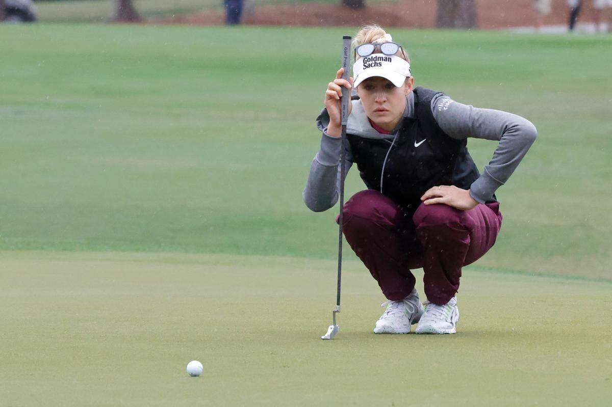 Dec 16, 2023; Orlando, Florida, USA; Nelly Korda lines up her putt on the fifth green during the PNC Championship at The Ritz-Carlton Golf Club. Mandatory Credit: Reinhold Matay-USA TODAY Sports