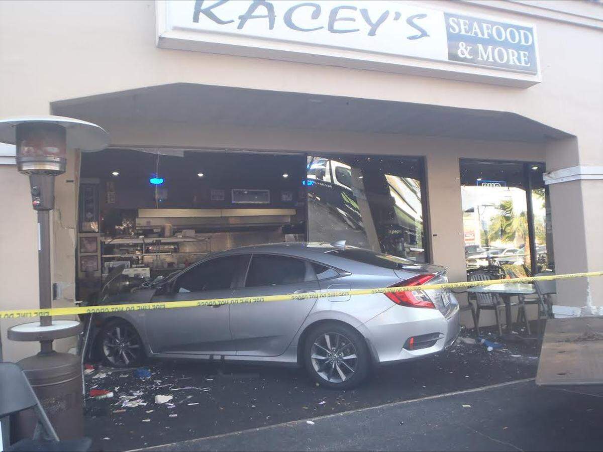 This photo was taken from the inside of Kacey’s Seafood & More Restaurant in Sarasota after a teenage driver drove into the restaurant and hit two diners on Friday, March 10, 2023.