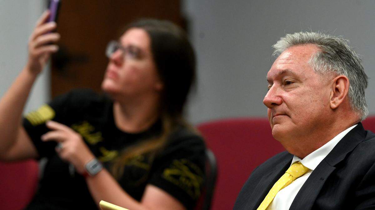 Jon Mast, CEO and chief lobbyist of the Manatee-Sarasota Building Industry Alliance, listens from the audience during the Manatee Board of Commissioners meeting on April 25, 2023.