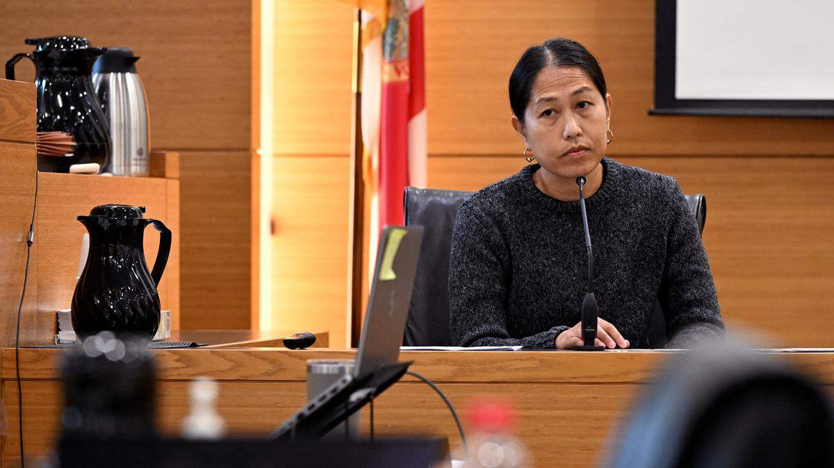 Dr. Phoutthasone Thirakul testifies during Aaron Koziak’s trial for the murder of Antonio Bradley. As Thirakul testified about the condition of the victim, a family member in the room appeared overcome with emotion and quietly left with a victim’s advocate. During an interview with detectives, Koziak confessed to shooting Bradley, then moving the body and lighting him on fire.
