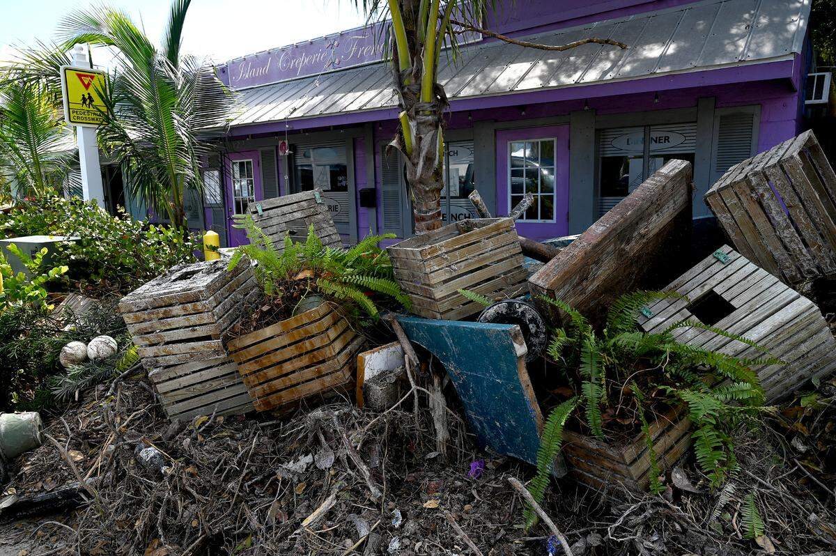 Debris piled up outside the Island Creperie in Bradenton Beach after Hurricane Helena on Oct. 2, 2024.