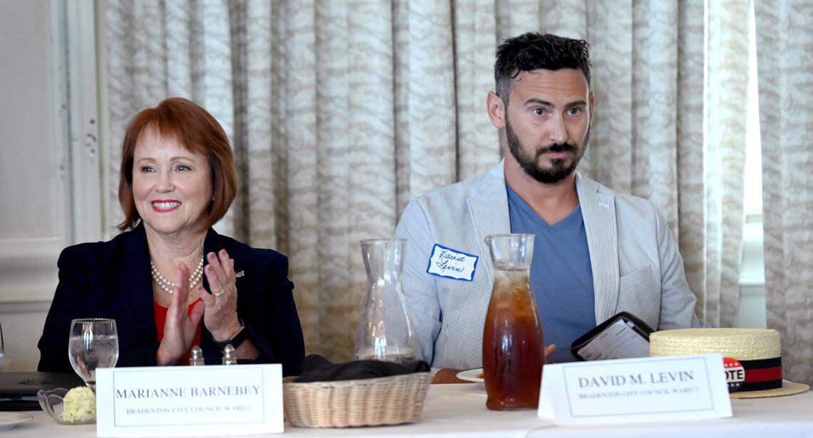 Incumbent Marianne Barnebey sits beside challenger David Levin for Bradenton City Council, Ward 2, during a debate at the meeting of the Manatee Tiger Bay Club at Pier 22 Sept. 22, 2022. Barnebey left the meeting after a brief statement.