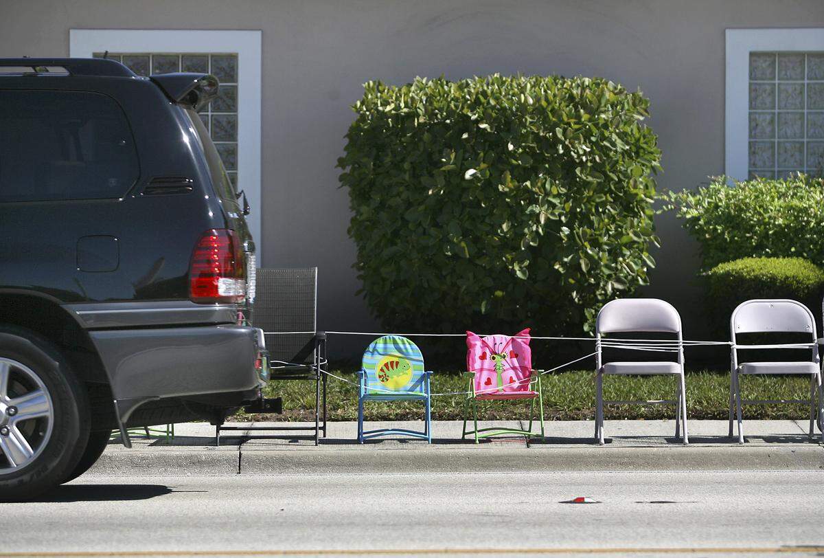 Chairs of all types and sizes line the street along Manatee Avenue in readiness for a previous DeSoto Heritage Grand Parade.