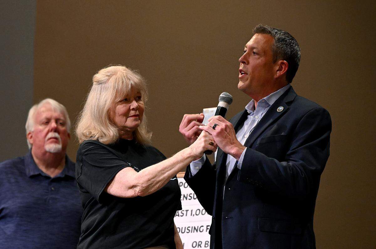 Manatee County Commissioner George Kruse with Charlotte Wright holding the microphone during a meeting of STREAM at the Harvest United Methodist Church in Lakewood Ranch to talk about affordable housing and criminal justice reform. The group, Stronger Together Reaching Equality Across Manatee celebrated some housing victories at the meeting but called for more.