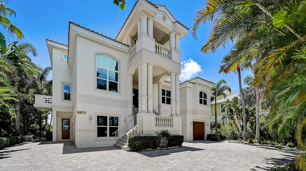 A home at 6877 Gulf of Mexico Drive recently sold for $9,450,000, making it the largest residential sale of the year in Longboat Key.