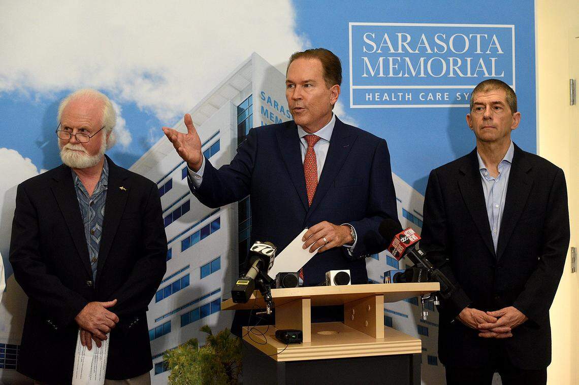Congressman Vern Buchanan held a press conference in 2019 at Sarasota Memorial Hospital to discuss plans to study the impact of red tide on health. With him are Dr. Michael Crosby, CEO and Pres. of Mote Marine and Dr. Michael Mullan, executive director of the Roskamp Institute.