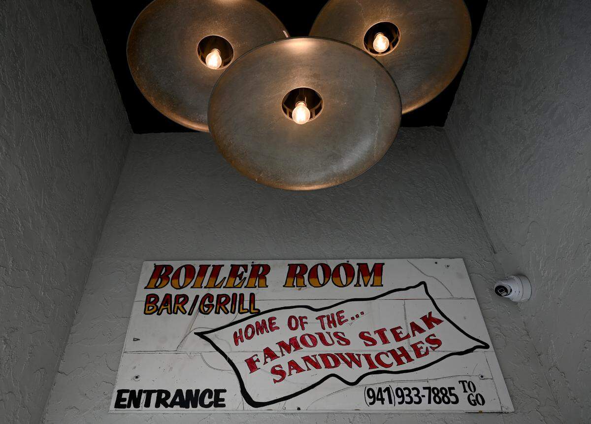 The original sign hangs over the front door of the newly reopened Boiler Room at 5600 Manatee Ave West in Bradenton on July 8, 2025.
