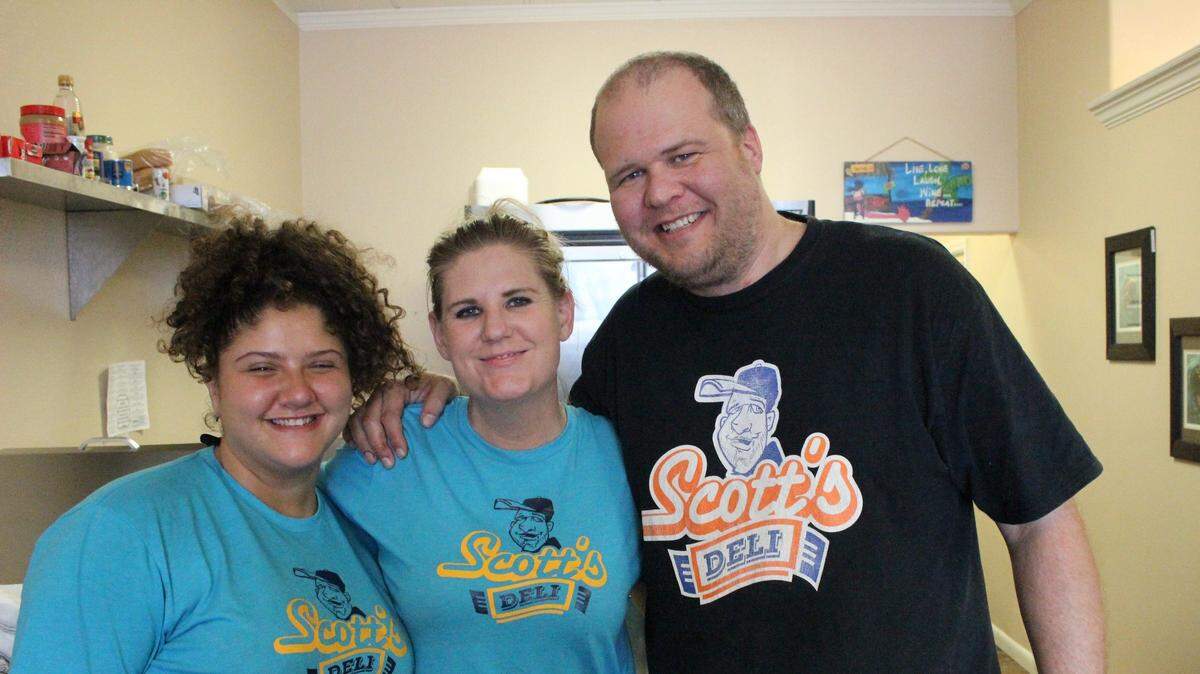 The Scott’s Deli staff, from left, Elyssa Grieco, Jamie Mason, and Scott Mason, now shares space with Island Coffee Haus at 5350 Gulf Drive, Holmes Beach.
