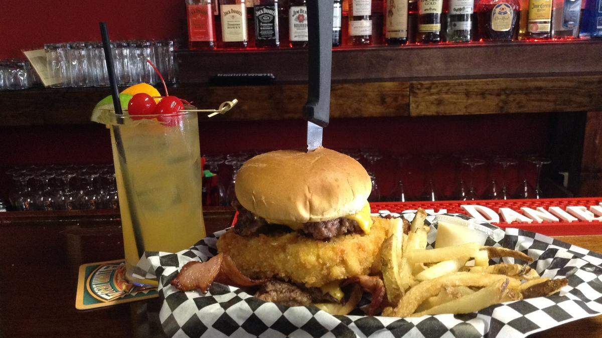 Hungry? Try the Holy Grail specialty burger at SOB Pub & Grub. It contains two 1/4-pound patties, pounded thin, with a fried mac and cheese patty in between. The restaurant is at 5866 14th St. w., Bradenton. 
 PHOTO PROVIDED