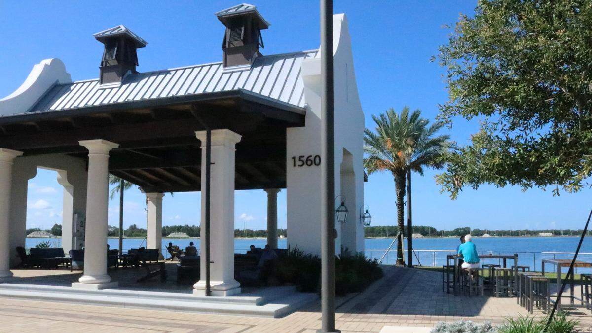 Justin Banister founded O&A Coffee and Supply in 2015 as a mobile coffee bar. In addition to the mobile coffee bar, he now has a coffee shop  in downtown Sarasota, and recently opened a coffee shop in Lakewood Ranch’s Waterside Place town center at 1570 Lakefront Drive, Unit 102. Guests often enjoy their coffee outside overlooking Kingfisher Lake, shown Sept. 20, 2022.