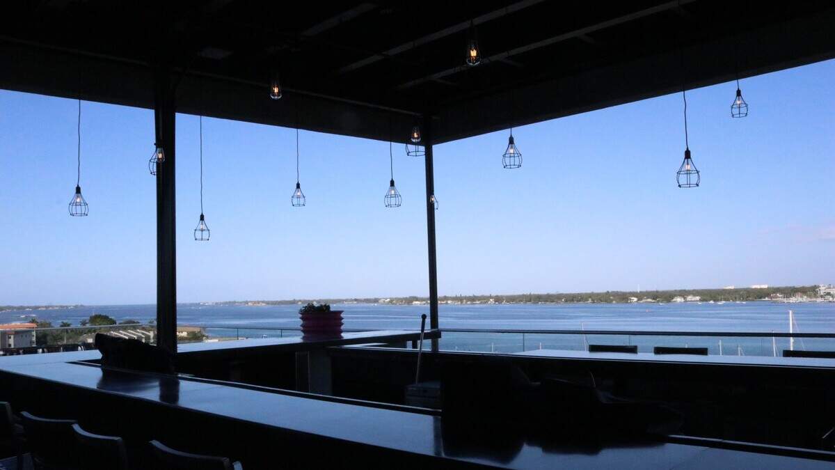 Here is the view from behind the bar at The Deck at Oak & Stone, which opens Monday, Dec, 23, atop the eight-story SpringHill Suites, 102 12th St. W., Bradenton.