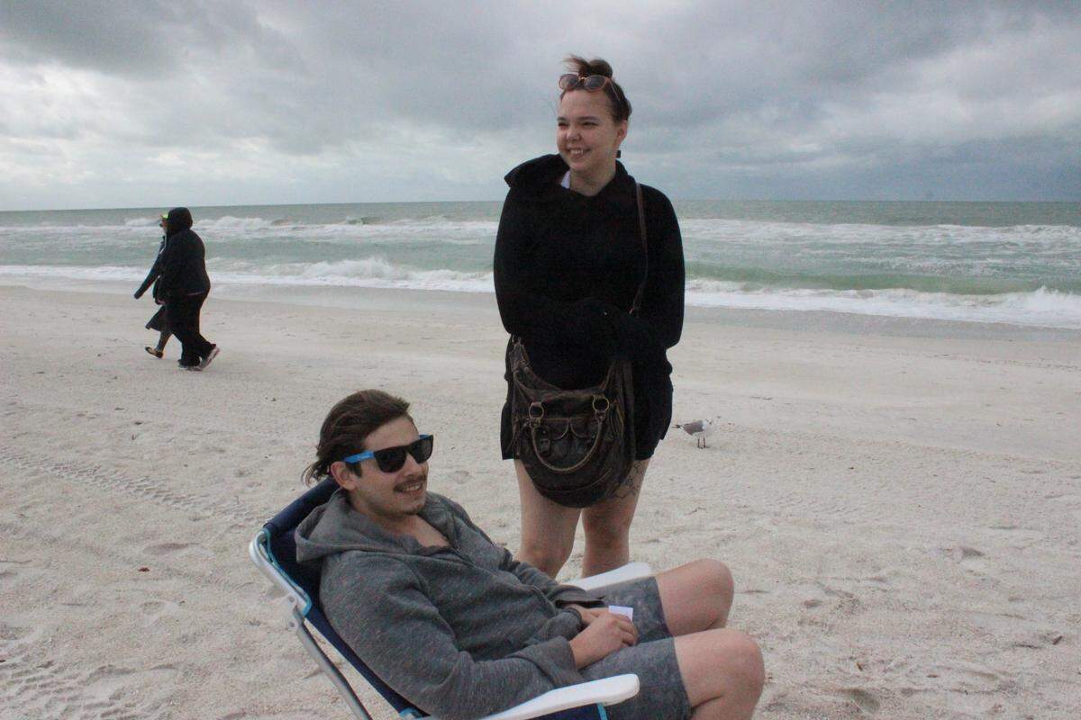 Kyle and Candace Stackpole of Georgia were enjoying Anna Maria Island on Monday. It was cold, but they did not experience any red tide.