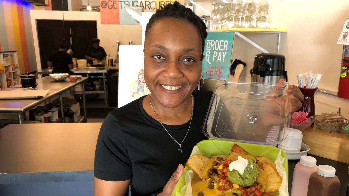 Paula Tromp opened Happy Soul Delight, a vegan restaurant, in the Sugar Cubed Pastry Lab space at 531 13th St. W., Bradenton, in late 2019. She is shown with a nacho platter.