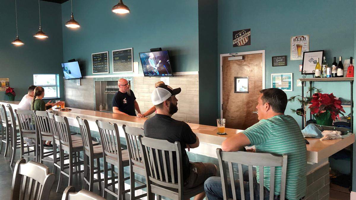 3 Car Garage Brewing, 8405 Heritage Green Way, Bradenton, has a very long bar, measuring about 35 feet.