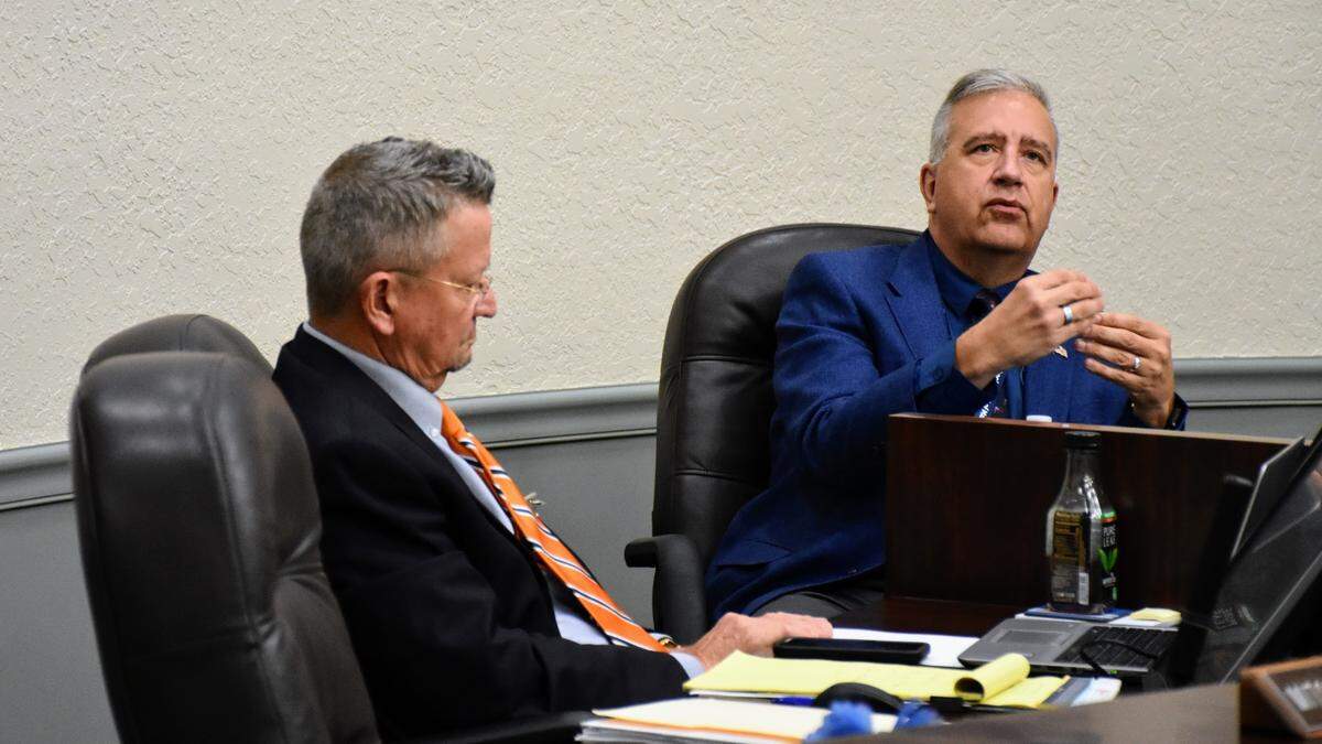 School Board Member Richard Tatem (right) discusses contract provisions for Jason Wysong, who the board picked as the Manatee School District’s new superintendent, during a Tuesday, May 16, 2023, public meeting.