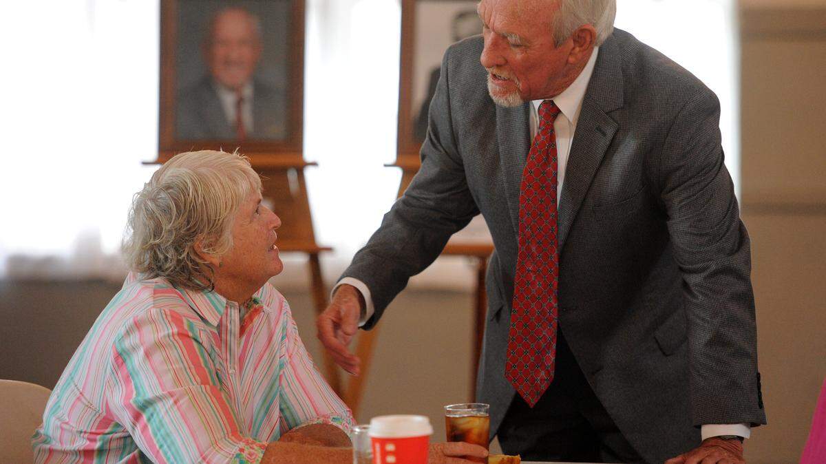 Manatee County Agriculturalist of the Year Priscilla Trace, of Ellenton Nursery Growers, talks with John M. Stevely, sea grant extension agent for Manatee County from 1979-2014, during the Farm City luncheon Thursday at the Palmetto Woman's Club. Stevely was inducted into the Manatee County Agricultural Hall of Fame during the luncheon. 
 GRANT JEFFERIES/Bradenton Herald